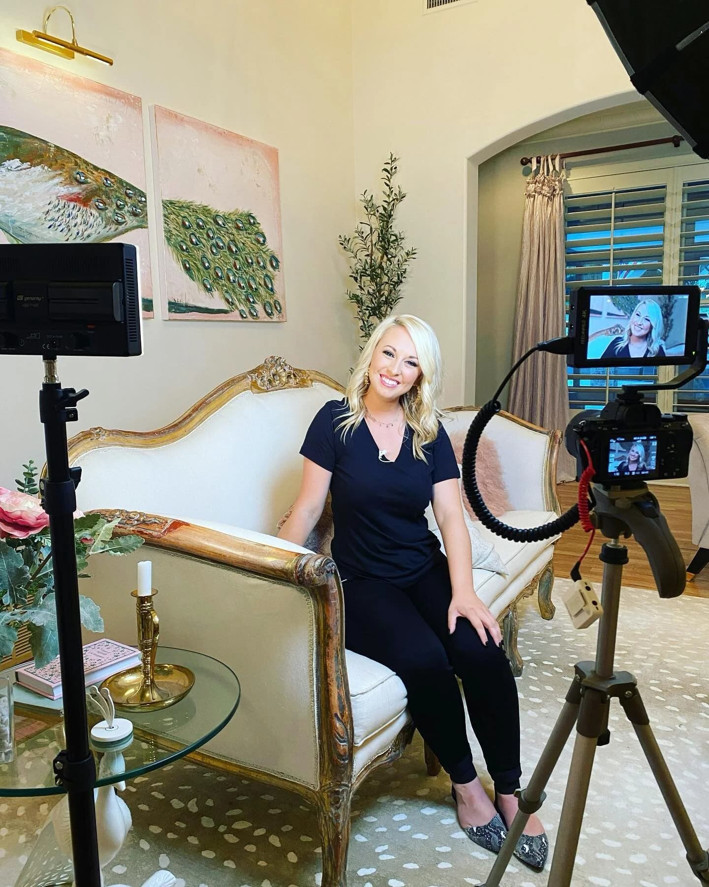 Lyndal Brumley seated in her studio