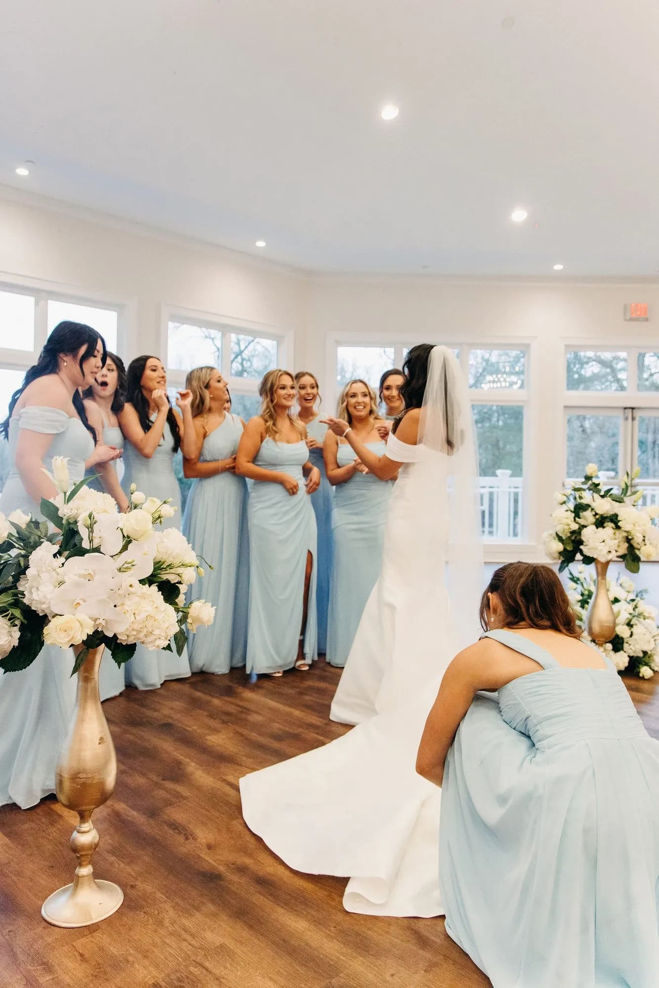 Cindy revealing her gown to her bridesmaids