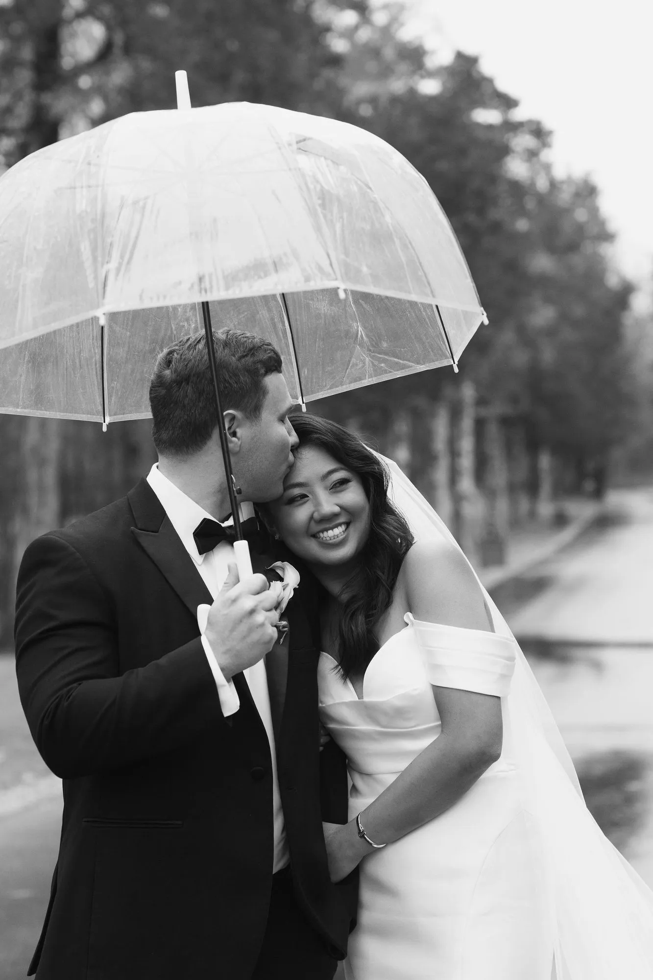 Umbrella portrait of Cindy and Nick in black and white