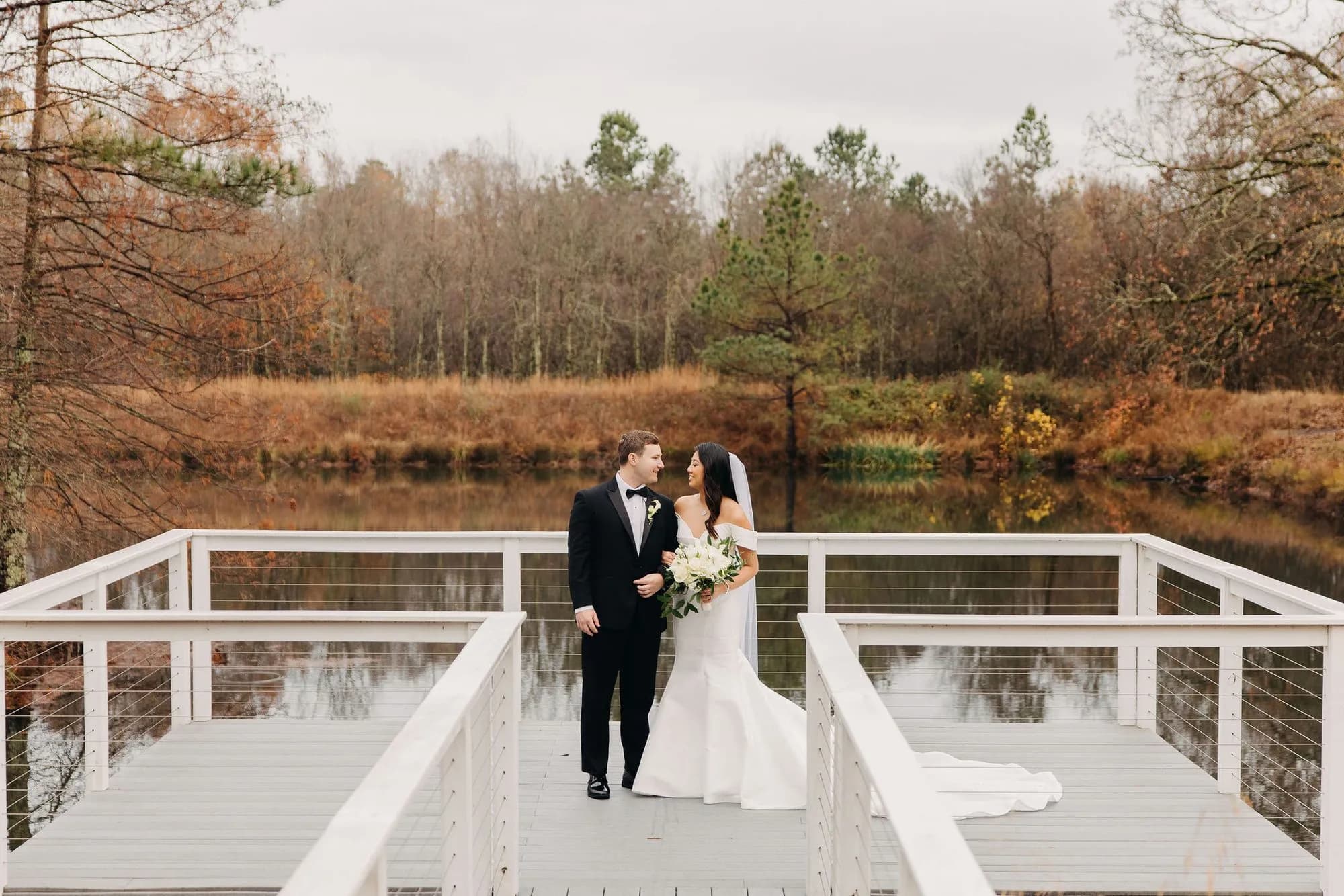 Portrait of the couple at the pond
