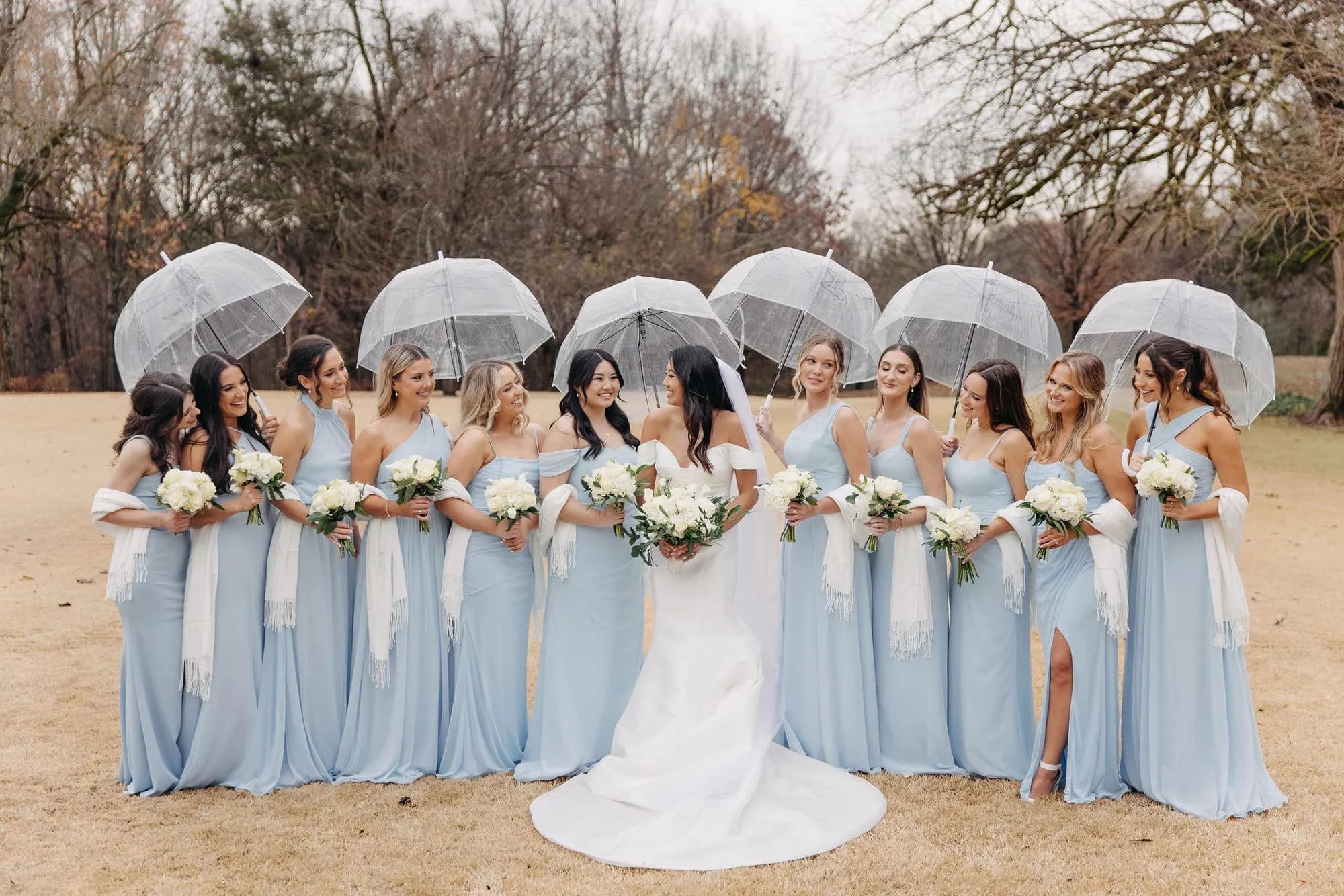 Bridesmaids under umbrellas
