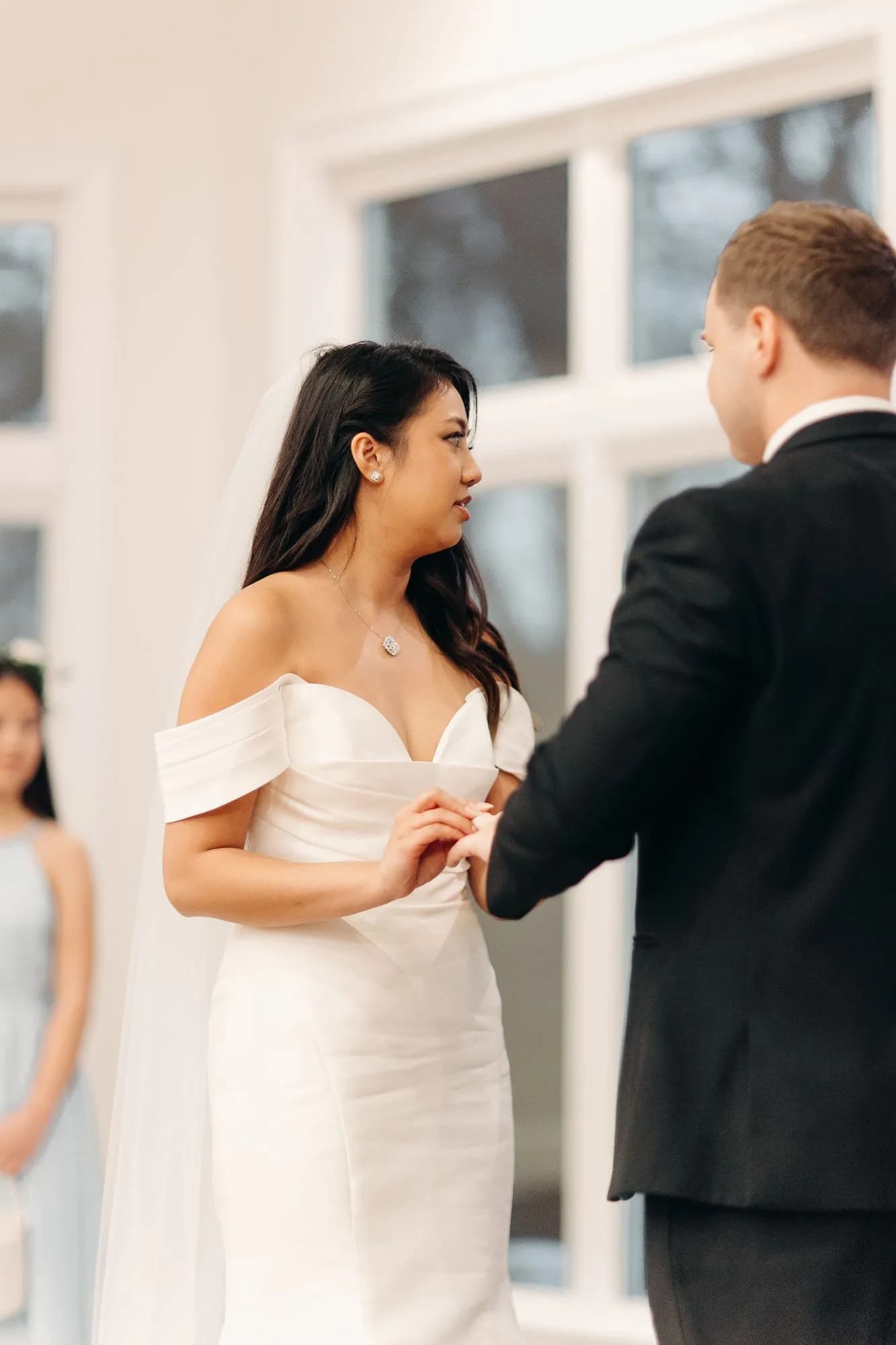 Exchanging rings during the ceremony