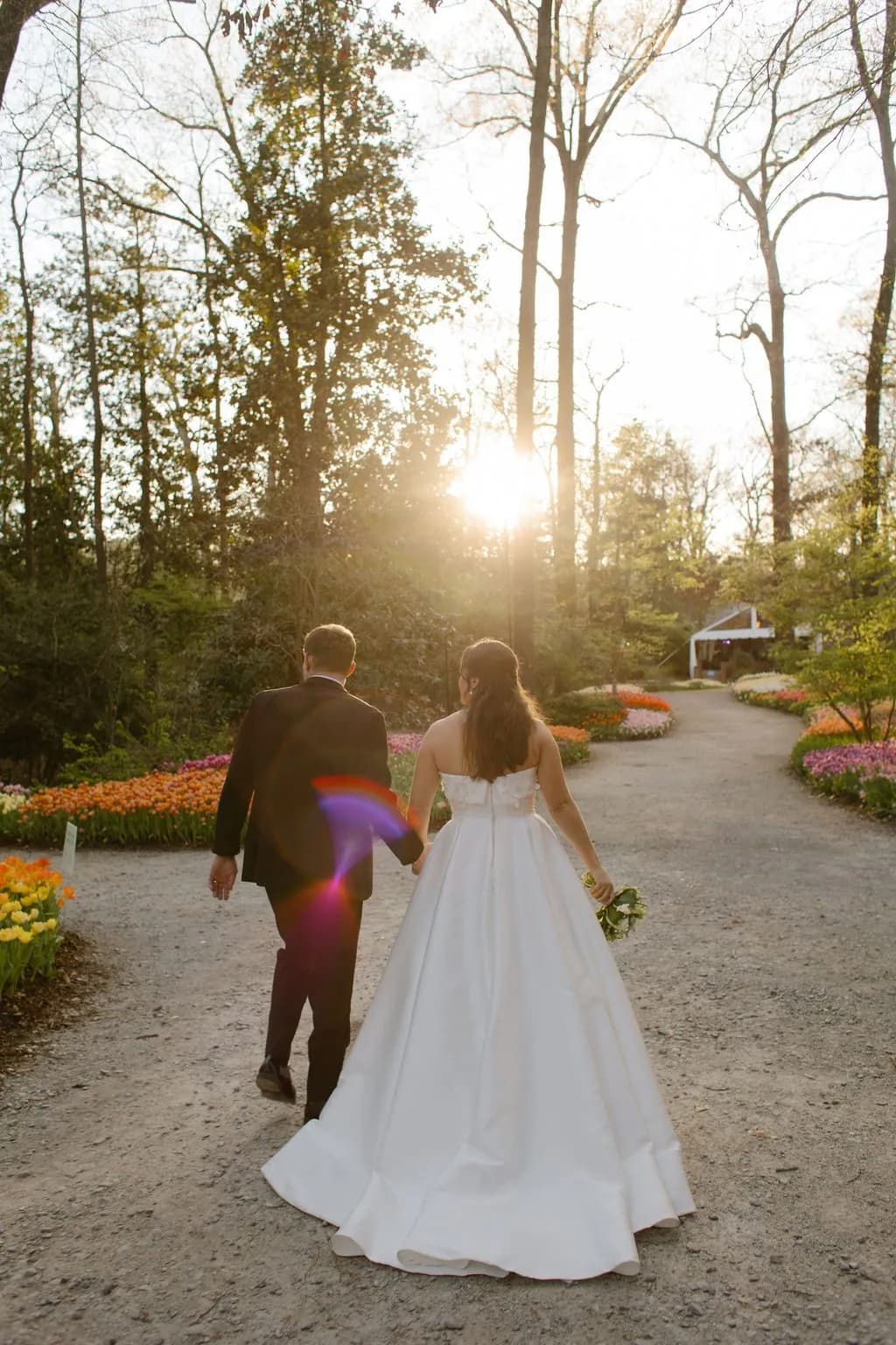 The couple walking into the sunset