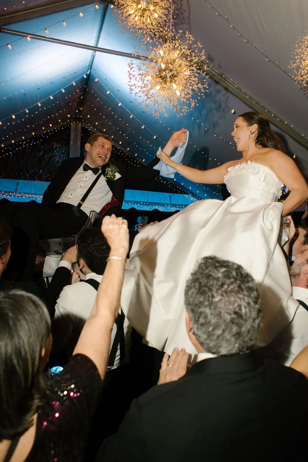 Sally lifted in a chair during the hora