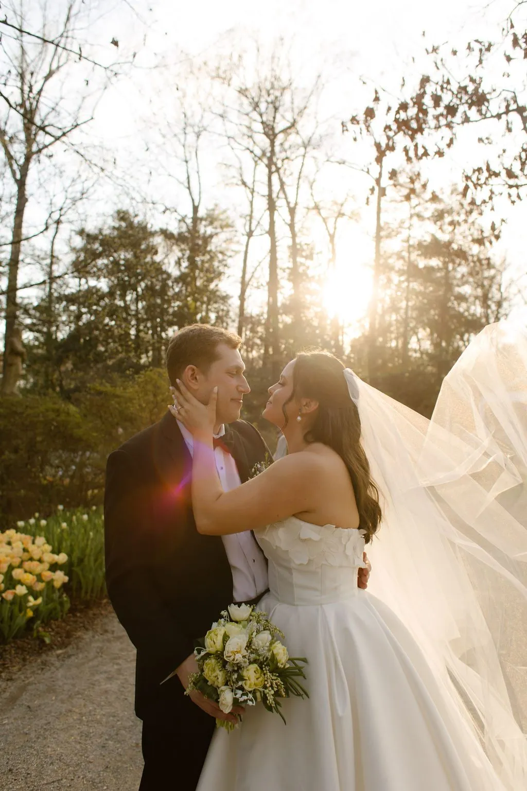Sally and Noah kissing at golden hour